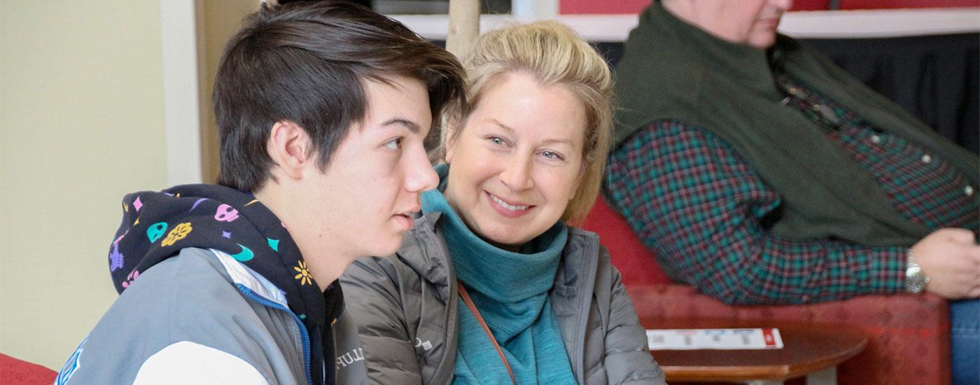 A mother looks on at her son during a Frostburg State Bobcat Welcome session